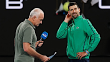 Novak Djokovic of Serbia is interviewed following victory over Pedro Martinez of Spain.