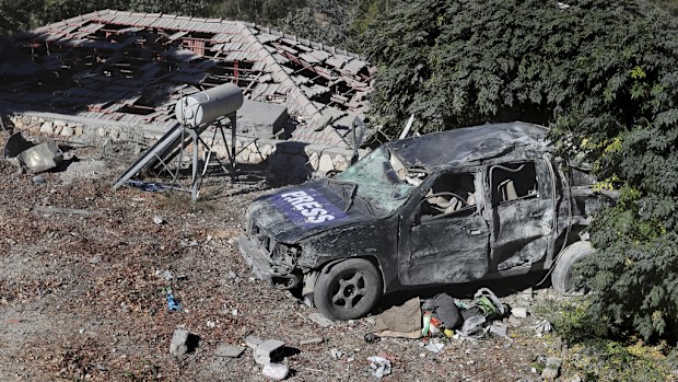A destroyed journalists' car at the site where an Israeli airstrike hit a compound housing journalists, killing three media staffers from two different news agencies according to Lebanon's state-run National News Agency, in Hasbaya village, southeast Lebanon, Friday, Oct. 25, 2024. (AP Photo/Mohammed Zaatari)