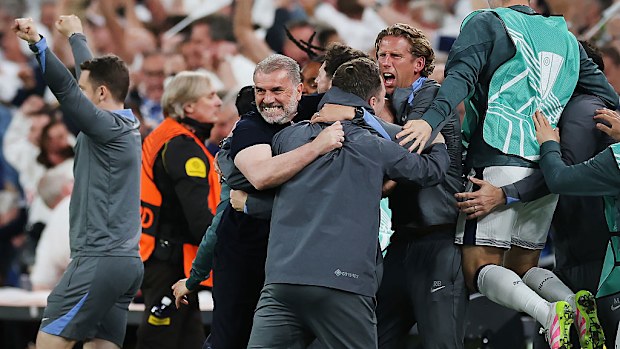Tottenham Hotspur manager Ange Postecoglou celebrates his team's opening goal.
