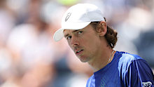 Alex de Minaur of Australia looks on against Leandro Riedi of Switzerland.