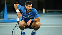Novak Djokovic of Serbia reacts against Carlos Alcaraz of Spain.