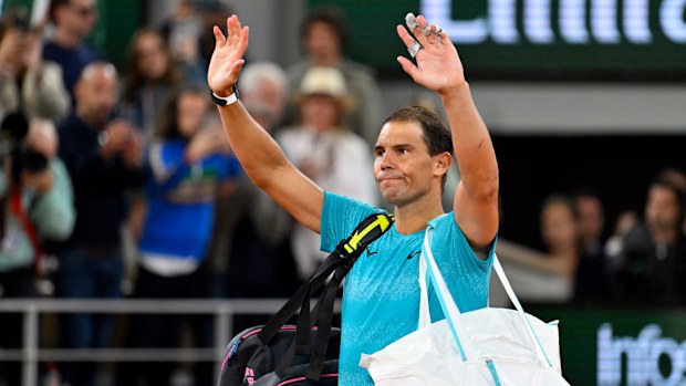 Rafael Nadal of Spain salutes the crowd after his Men's single first round match against Alexander Zverev at the 2024 French Open. 