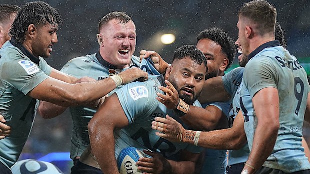 Taniela Tupou of the Waratahs celebrates scoring his team's third try.
