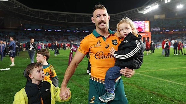 Nic White of the Wallabies is seen with his children.