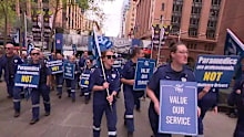 Paramedic members of the union marched on the Minns government's ministerial office tower in Sydney.