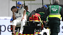 Rishabh Pant leaves the field on a medical cart after taking a blow to the foot.