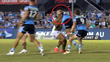 Sharks player Wade Graham hits South Sydney's Davvy Moale.