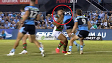 Sharks player Wade Graham hits South Sydney's Davvy Moale.