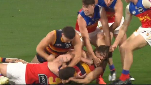 Brawl breaks out after James Peatling's dangerous tackle on Lachie Neale.