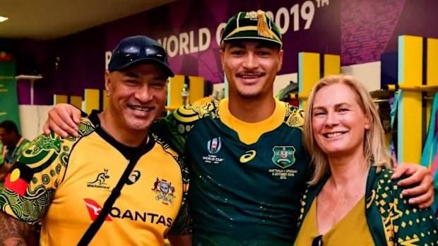 Jordan Petaia with his parents at the Rugby World Cup.