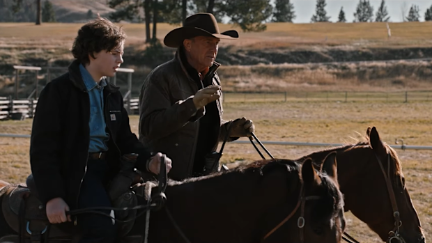Kevin Costner as John Dutton and Finn Little as Carter in Yellowstone Season 4 on Stan