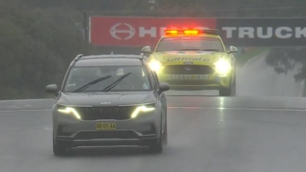 A Kia Carnival with representatives from Motorsport Australia and Supercars doing a track inspection ahead of the cancellation of the top-10 shootout for the Bathurst 1000.