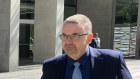 Former Logan mayor Luke Smith leaves the District Court on Tuesday.