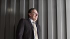 Qube managing director Maurice James says the stevedores' controversial new truck fees flow from a "perfect storm".