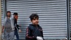 An anti-government protester prepares to throw a molotov cocktail during clashes in Baghdad in 2019.