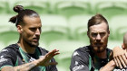 Aleksandar Prijovic celebrates a goal with Western United teammates.