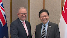 Anthony Albanese and Lawrence Wong.