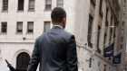 Finding its footing: A pedestrian on Wall Street near the New York Stock Exchange (NYSE) in New York, US, on Wednesday, Sept. 18, 2024. 