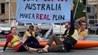 Extinction Rebellion protesters stop the traffic in Brisbane last year. 