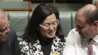 Liberal Gladys Liu is flanked by Prime Minister Scott Morrison and Treasurer Josh Frydenberg during a division in Parliament after shadow attorney-general Mark Dreyfus moved to suspend standing orders on Thursday. 