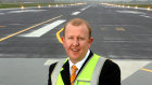 Canberra Airport boss Stephen Byron has criticised Qantas for mistreating its staff and customers.