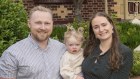 Ruby Rockman, husband Andrew Sweatman and their toddler, Ivy, outside their Frankston home.