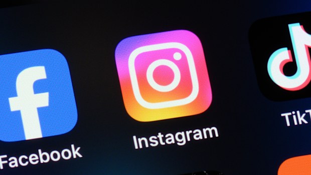 Toronto, Canada - August 22, 2024:    Popular social media apps on an Apple iPhone: Facebook, Instagram, TikTok, Threads, X (formerly Twitter), and Reddit.