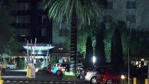 Police respond to an incident at a Melbourne hotel.