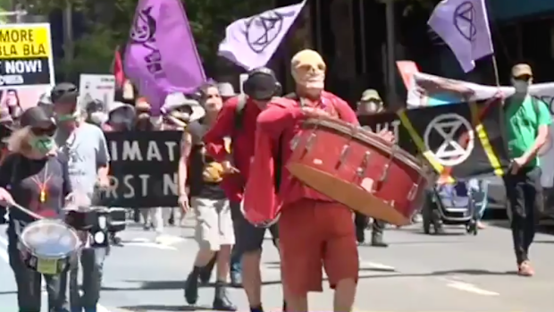 The protesters marched through the CBD to call for more action around climate change.