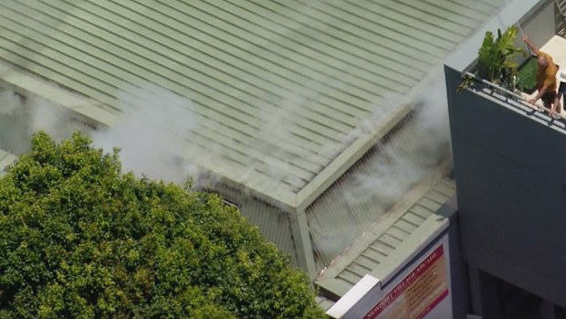 A fire has broken out at a parade of shops on Sydney's Northern Beaches.Fire crews rushed to Newport, north of Manly, at lunchtime, with reports of a fire in the roof of the Newport Village Arcade.