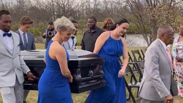 Groom carried to altar in coffin