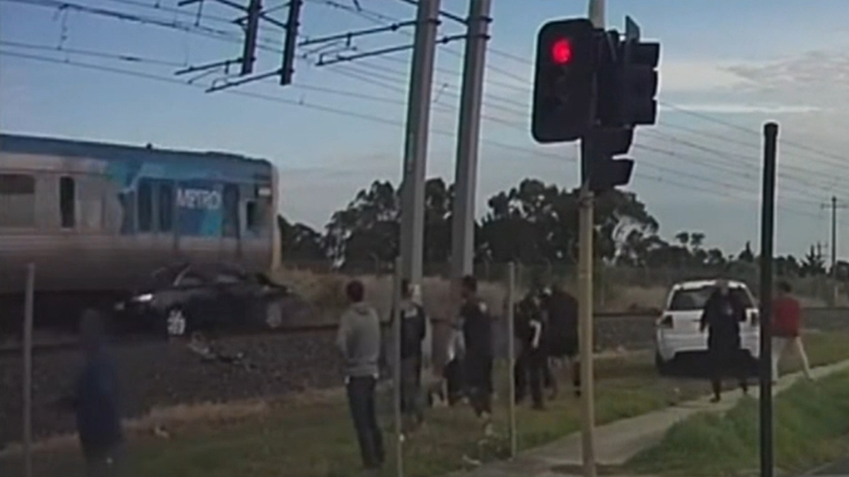 Melbourne driver rescued moments before train hits car | Nine.com.au