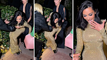 Kim Kardashian falls into a bush en route to 2026 Oscars after party.
