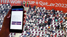 A Wales fan shows an error with their match ticket on the FIFA Qatar 2022 app.
