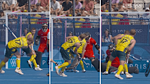 Australia scores its first goal against New Zealand in the men's hockey Pool B match in Paris.