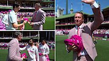 Glenn McGrath receives pink baggy caps from India and Australia.