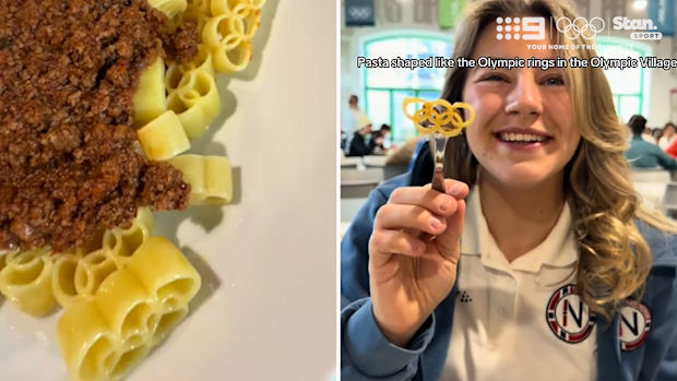 Norwegian athlete Aurora Løvås tries the Olympic rings-shaped pasta in the athletes' village at Milano Cortina 2026.