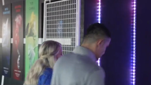 Tim Cahill was dragged away from an interview.