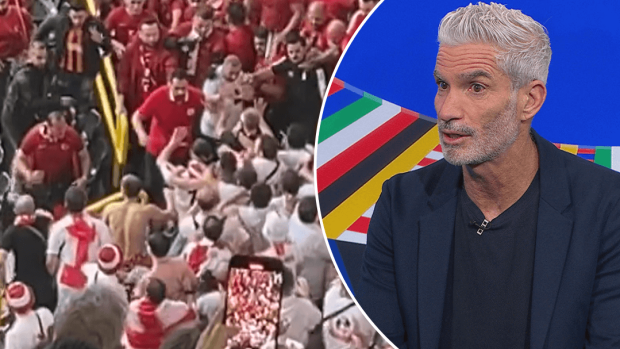 Craig Foster reacts to crowd behaviour at the Euros.