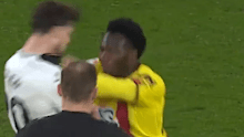 Nestory Irankunda pushes a Swansea player.