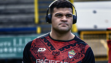David Fifita warms up ahead of Tonga's clash with France. 