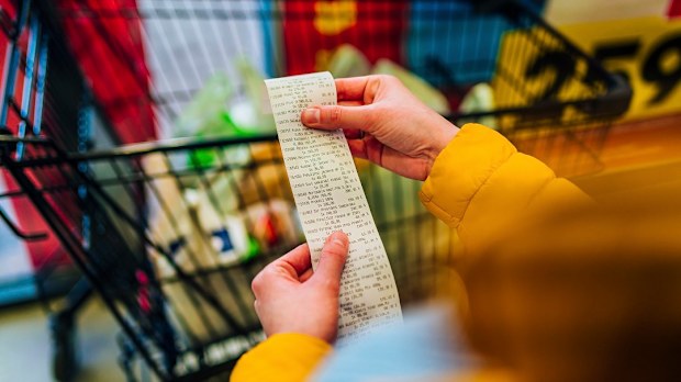 paying for groceries at the supermarket