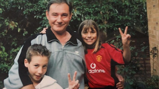Steph Catley as a child with her father and brother.