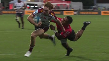 Tim Ryan, the 'Junkyard Dog' on his way to his fourth career try for the Reds against the Crusaders.