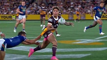 Reece Walsh sends a forward pass out to Selwyn Cobbo.