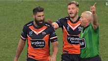 James Tamou is sent off by Ben Cummins.