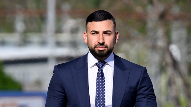 Omar Lababidi (right) arrives at Campbelltown Local Court, Sydney, Wednesday, October 8, 2025. (AAP Image/Steven Markham)