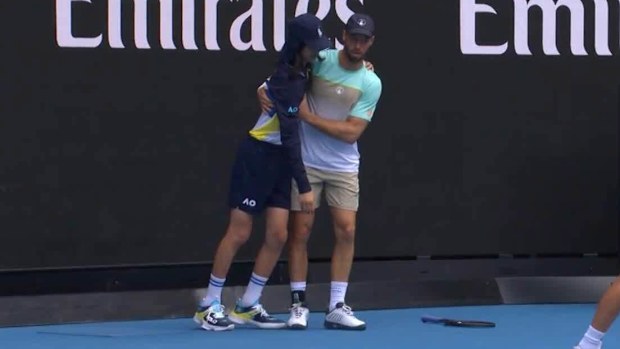 Germany's Tim Pütz immediately rushes to the aid of a ball girl during his mixed doubles clash.