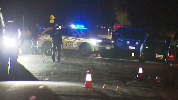 Police at the scene of the crash on Hillier Road in Hillier.
