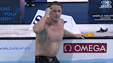 Elijah Winnington sends a message to onlookers after taking out the men's 400m freestyle final at the World Short Course Championships.